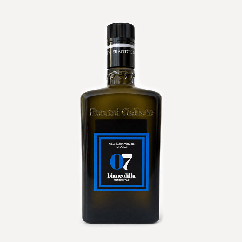 A bottle of Frantoio Galioto's Biancolilla 07 olive oil, featuring a dark green glass bottle with a black cap and a blue and black label, set against a light gray background.
