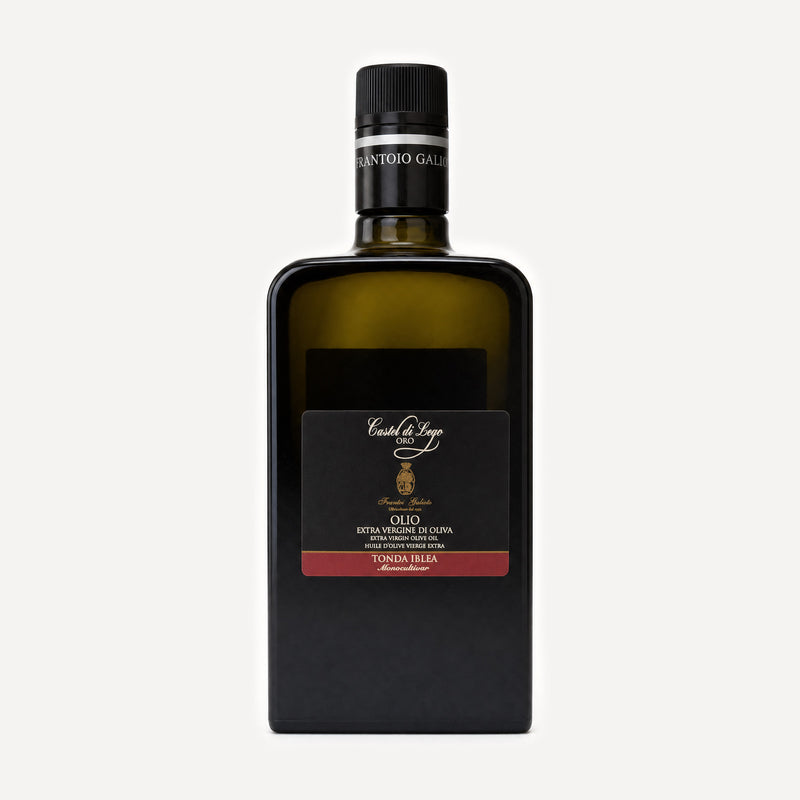 A bottle of Castel di Lego ORO extra virgin olive oil by Frantoio Galioto, featuring a matte black rectangular bottle with a dark olive-green liquid inside, a black cap, and a black label with gold and red accents.