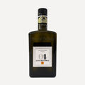 A dark olive-green glass bottle of D.O.P Monti Iblei 04 by Frantoio Galioto