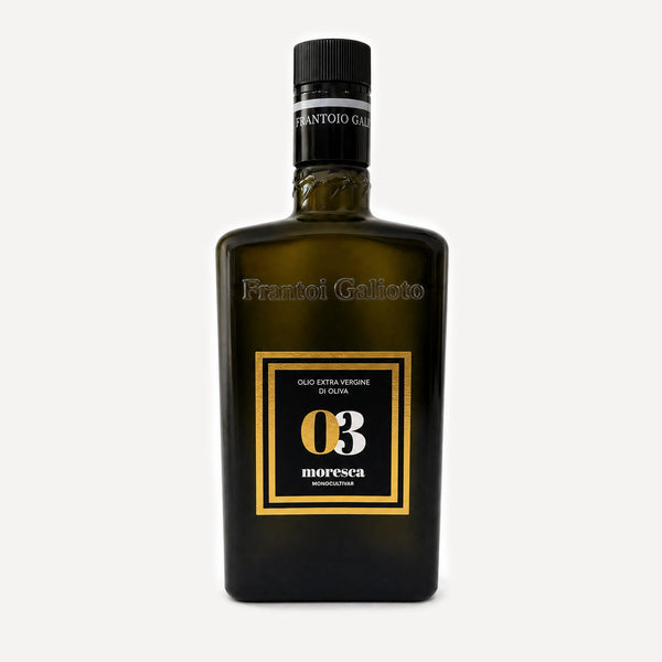 A dark olive-green glass bottle of Frantoio Galioto Moresca Extra Virgin Olive Oil, featuring a black cap and a black label with gold borders and white text.